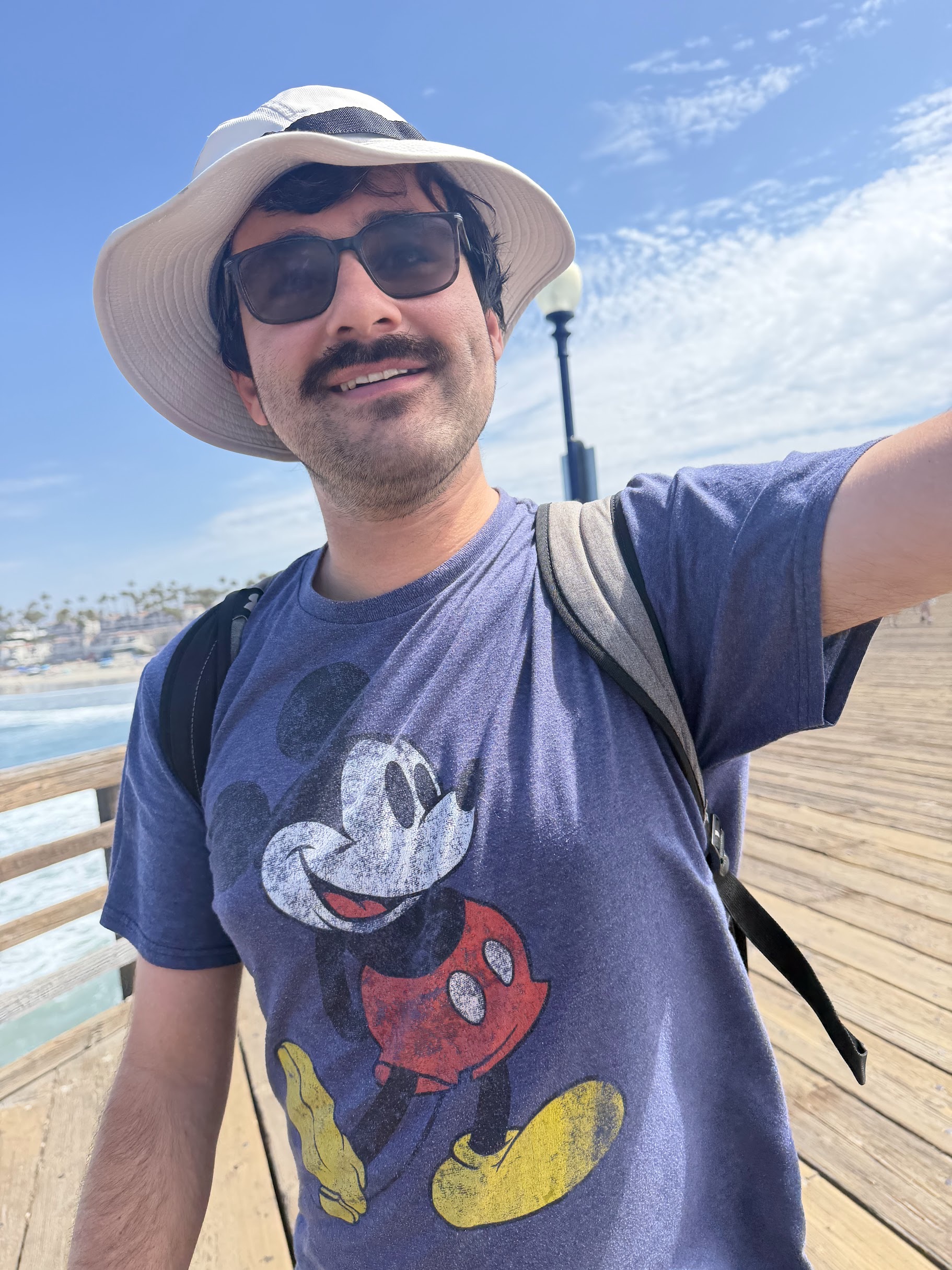 Matthew smiling on a sunny day